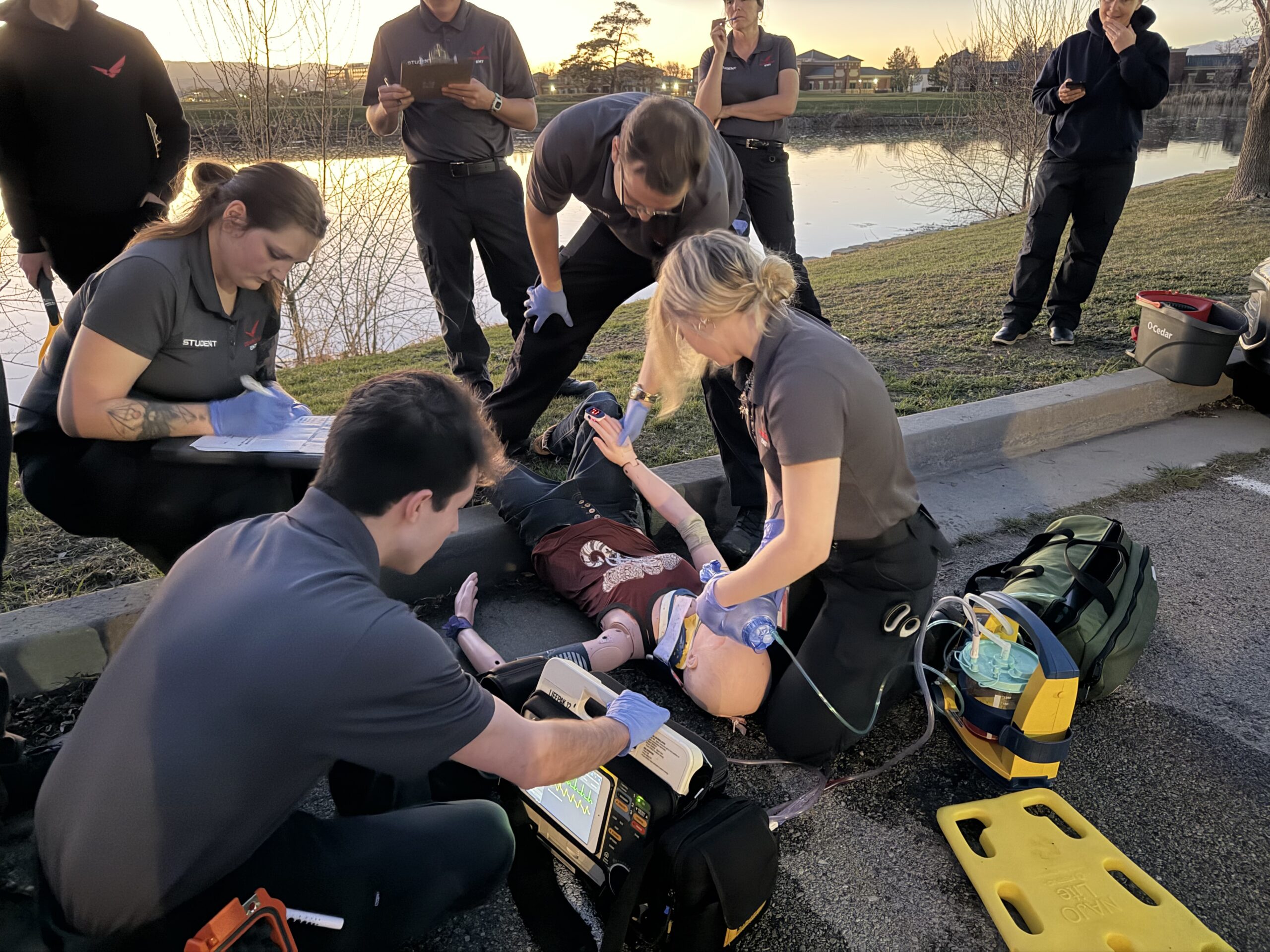 Guardian EMT advanced students running a night scenario with headlamps during an AEMT clinical training exercise