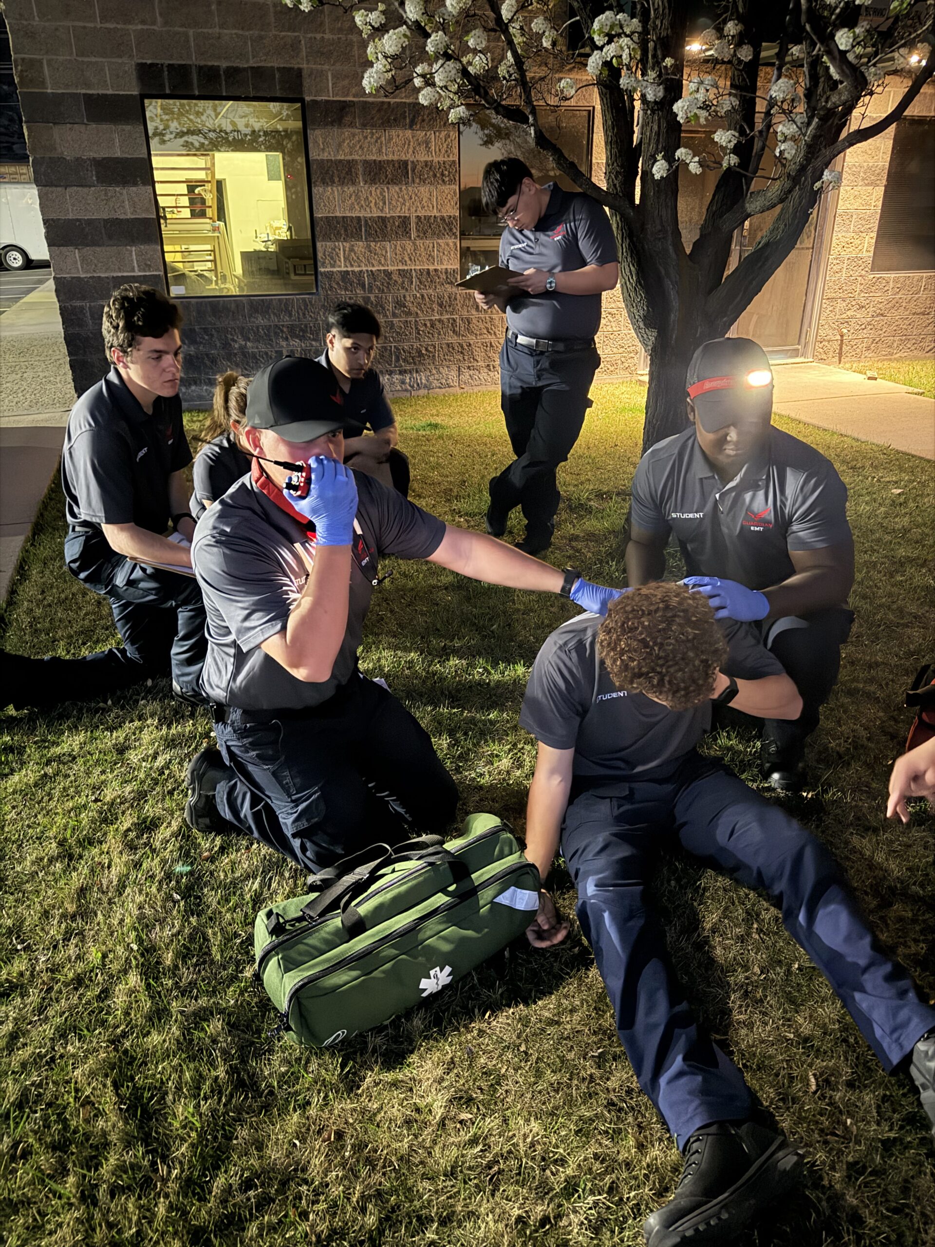 Guardian EMT students practicing intubation and airway management in the classroom lab